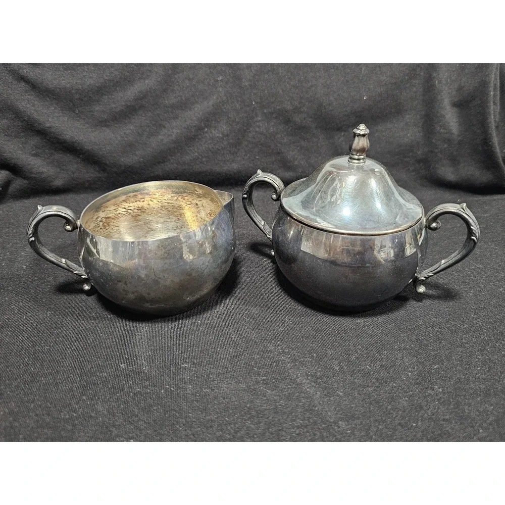vintage silver-plated creamer and lidded sugar bowl set